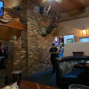 a woman standing in the dining room