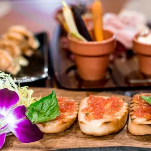 Bruschetta: Roasted Tuscan Bread, Kamuela Tomato Basil, Garlic, Fresh Oregano, Extra Virgin Olive Oil