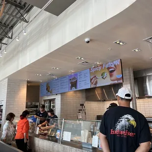 a man standing in front of a counter