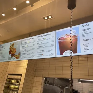 menus on the wall of a restaurant