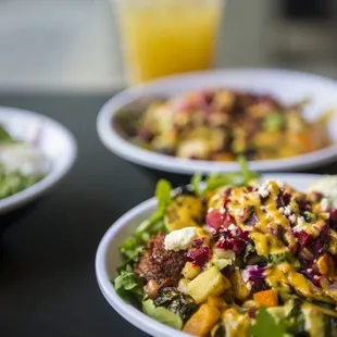 three plates of food on a table