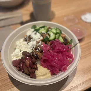 Greek salad bowl with onions