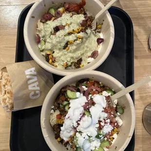 Two rice bowls with chicken