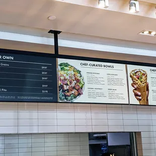 menus on the wall of a restaurant