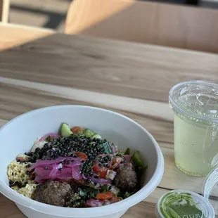 Right rice with half chicken and meatball