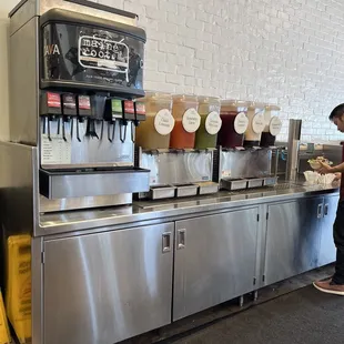 View of drink station. See the water wayyyy on the end past the juices. That's where you will find it! LOL ;)