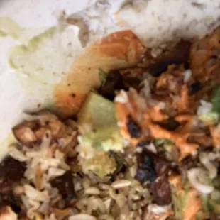 Grain bowl with rice that was not cooked at all.