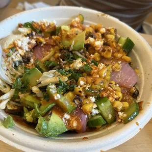 Harissa Avocado bowl. My friend ordered this. I think that's what it's called. It has chicken in it as well.