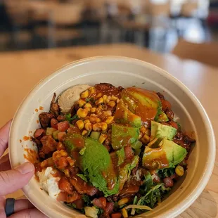 Harissa avocado bowl with honey chicken $14