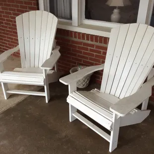 Chairs outside of oceanfront rooms
