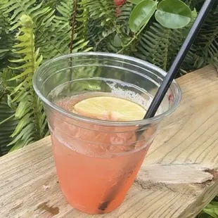 a drink in a glass with a straw