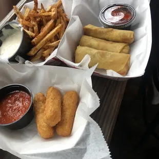 Old bay fries, cheesesteak spring rolls and mozzarella sticks