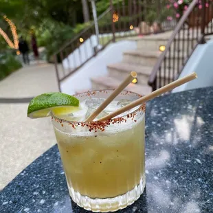 Tamarind and Smoke (mezcal, muddled cucumber, lime, tamarind syrup, chili salt rim)