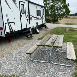 Great campsite size with fire pits and a table!