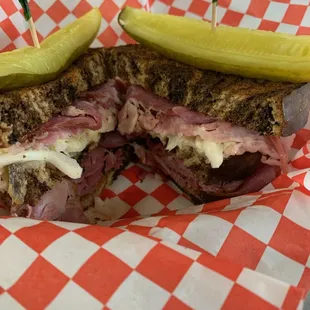 Smoked Corned Beef Double Decker on marble rye with jack cheese and slaw.  March only!