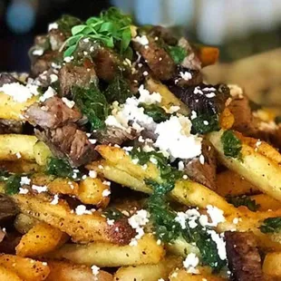Chimichurri steak fries appetizer. Big enough for a meal or shared appi.