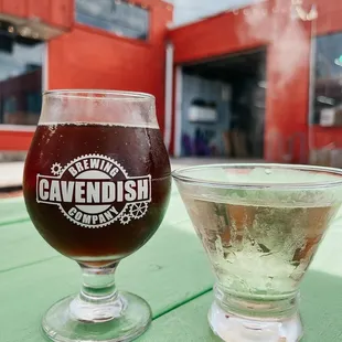 a glass of beer on a table