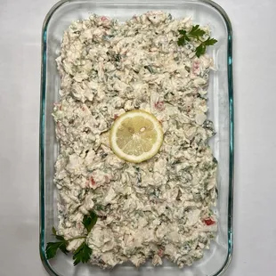 a lemon slice in a glass dish