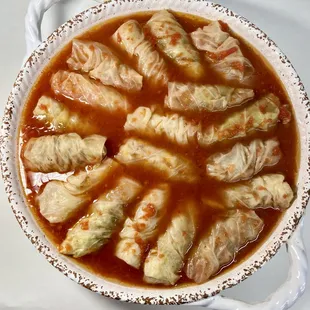 a dish of cabbage rolls