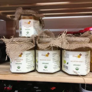jars of honey on a shelf