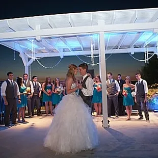 An outdoor wedding and reception in Pala with custom uplighting from Temporary Tempo.