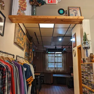 Leading to the back room (bathroom is in that doorway on the right)