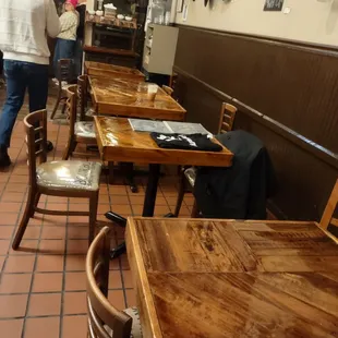tables &amp; chairs across from coffee counter