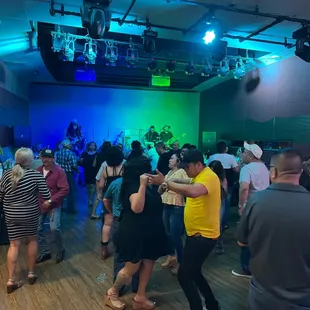 a crowd of people dancing