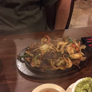 The Parrillada Cazadores Fajitas with Steak, Chicken, Shrimp, Chorizo and Pork. My hubby ate Every Bite.