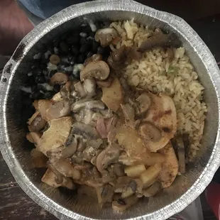 Pollo Hawaiano (Chicken topped with mushrooms, pineapple cubes, ham and cheese.  Side of black beans and rice).