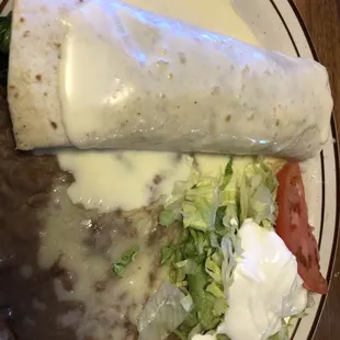 Burrito Zacatecas with side of refried beans &amp; &quot;salad&quot;