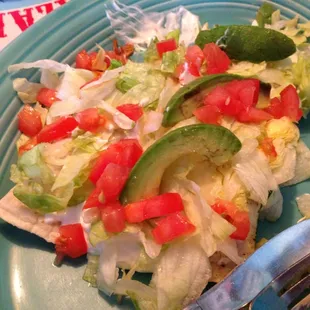 Shredded Pork In Dried Red Chili Sauce burritos, topped with white cheese dip and veggies