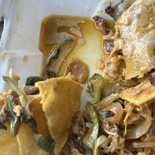 Grease pool in the bottom of the to go container.