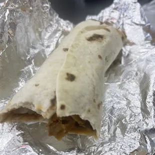 a close up of a burrito