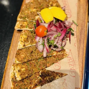 Doner Kebap
 Made fresh daily. Layers of lamb and beef leaves on our vertical roaster.
