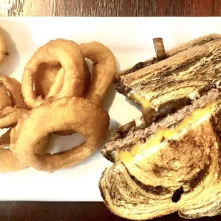 Cb3 burger in brioche bread with onion ring