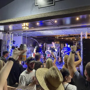 a band performing on stage