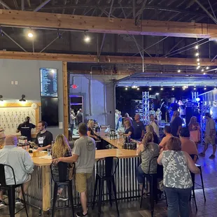 a large group of people at a bar