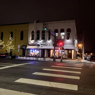 the corner of a street at night