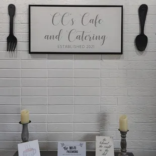 a table with candles and menus