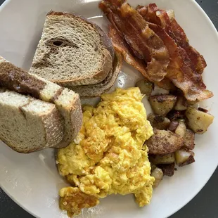 CC's breakfast special was very good with bacon, breakfast potatoes, and marble rye. Order cheese with the eggs to make it better.