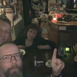 a group of people at a bar