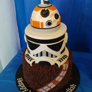 Star Wars themed cake. Red velvet top two and bottom is chocolate with buttercream filled. Delicious! (And NO this was NOT the smash cake)