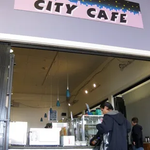 a man standing in front of the counter