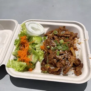 Spicy Korean bbq pork on rice with side salad. Mildly spiced, very delicious, great lunch special. $7.99