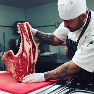Chef Carlos butchering away!