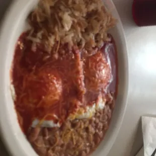 a bowl of food with rice and beans