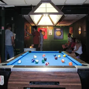 a pool table with balls on it