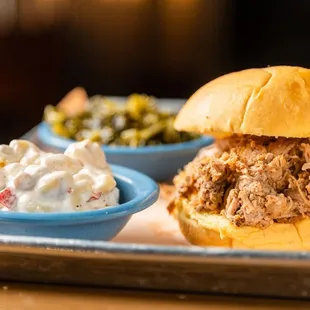 a pulled pork sandwich with cole slaw