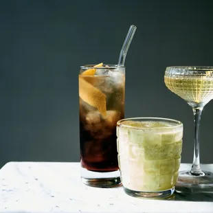 two cocktails on a marble table